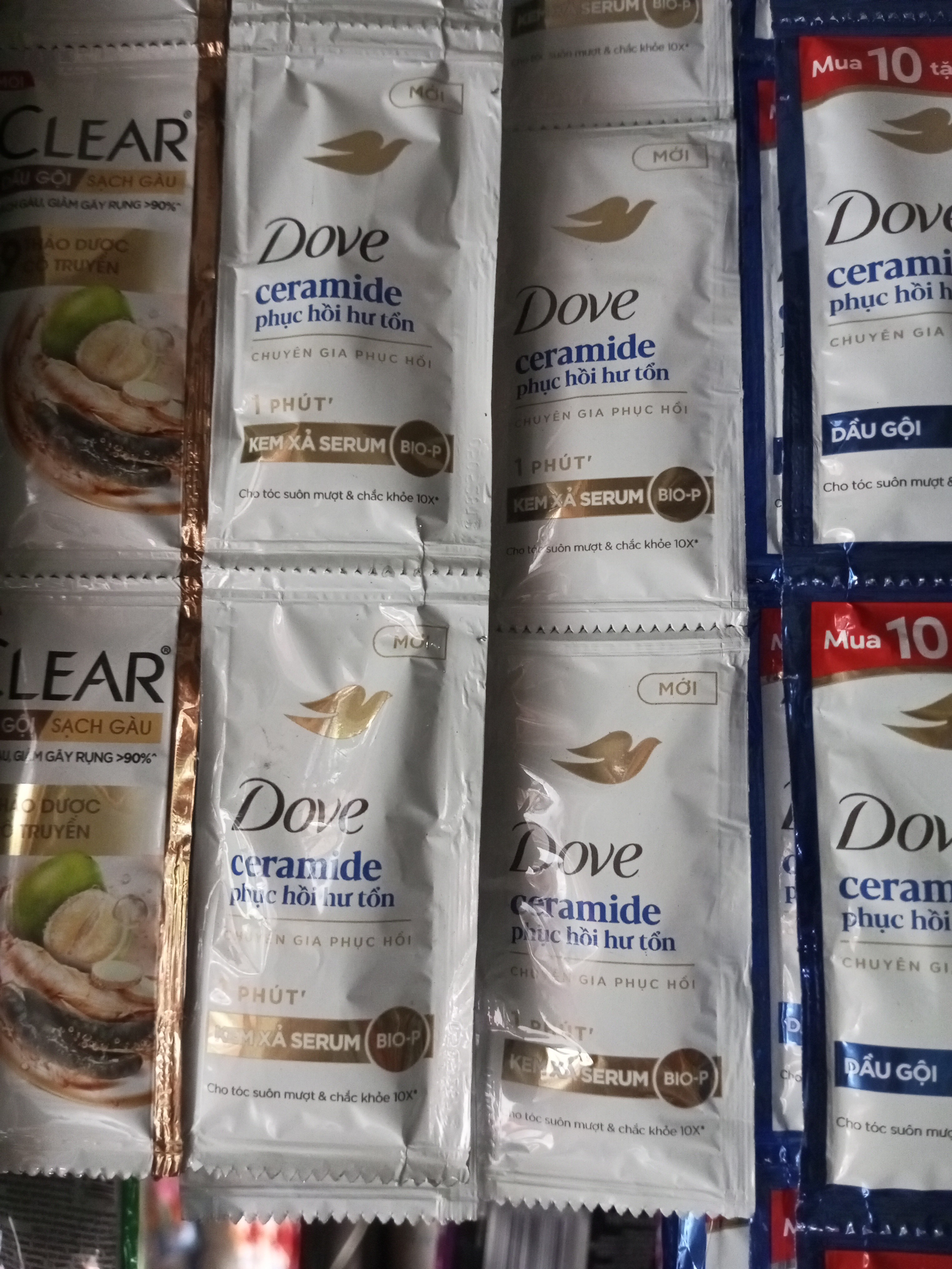 Dây xả tóc Dove ceramide phục hồi hư tổn